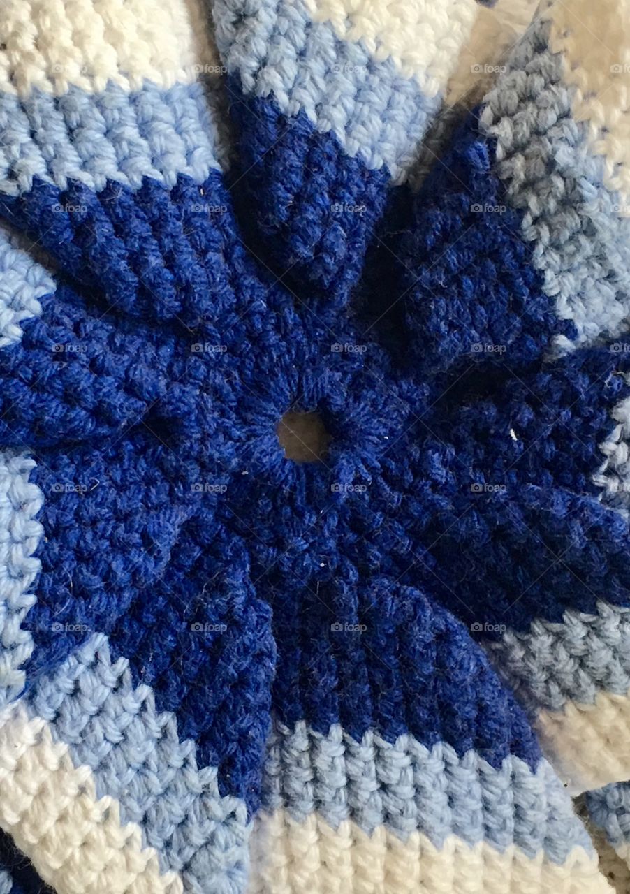 Crocheted blue geometric potholder 