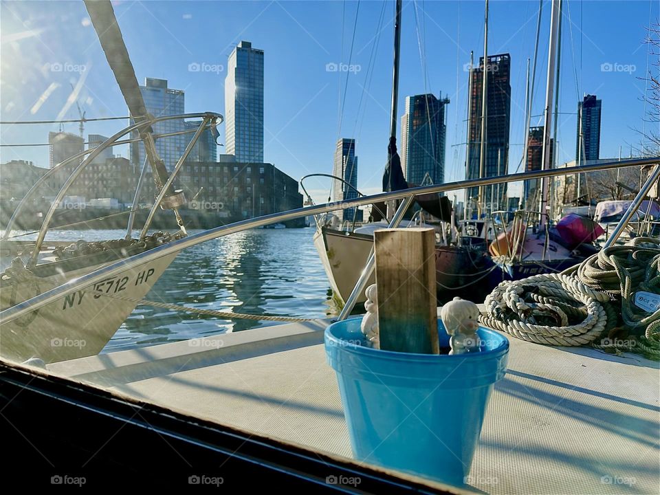 This is “Newtown Creek” in LIC, Queens seen from inside “Salvation”, the “28 foot 1969 Luhrs” cabin cruiser that I and my partner “Timothy Trespas” call home. The views through our window are amazing round the clock. 2023. Hypnotic Productions