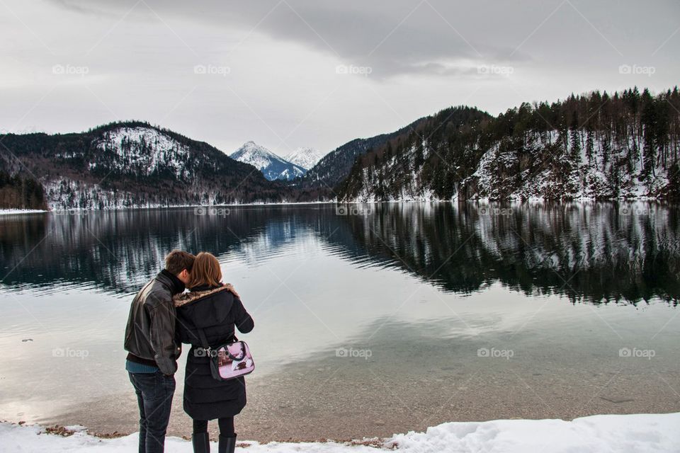 Couple enjoying the lake view 