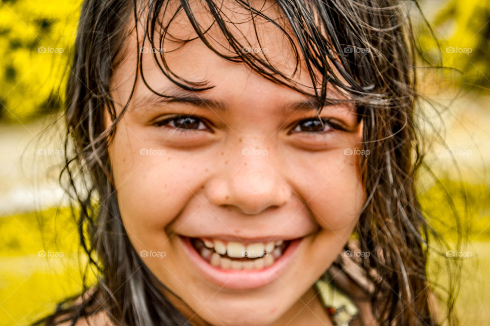Headshot of a happy indian girl
