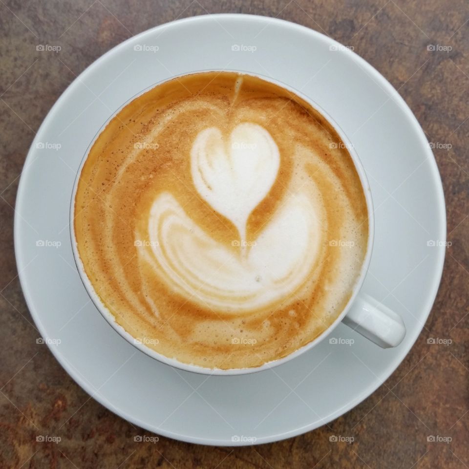 flower on coffee