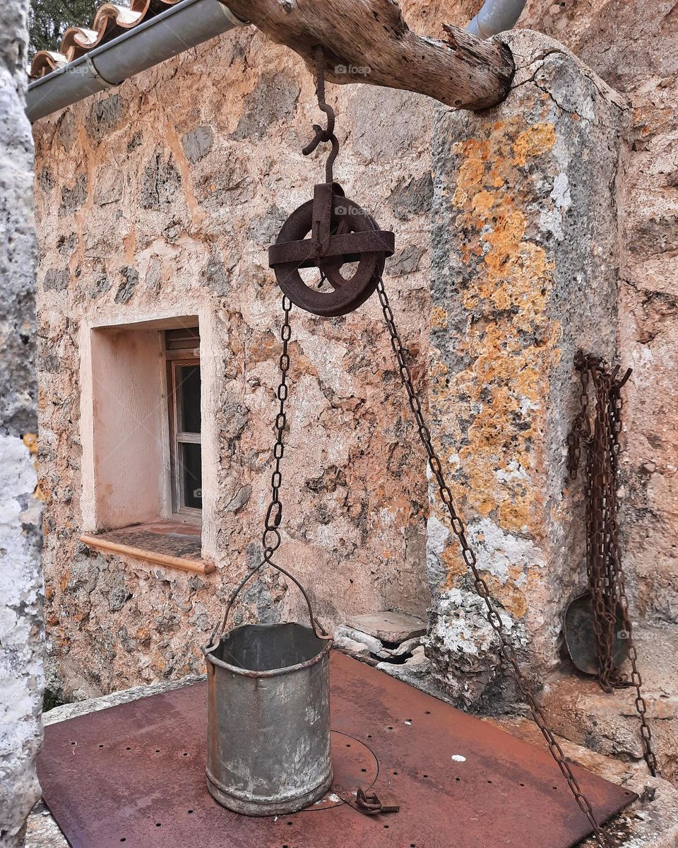 A beautiful rustic corner of a castle located on the top of a mountain in Mallorca. Capture taken in autumn.