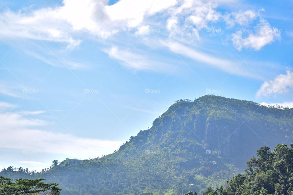 Mountain kissing sky