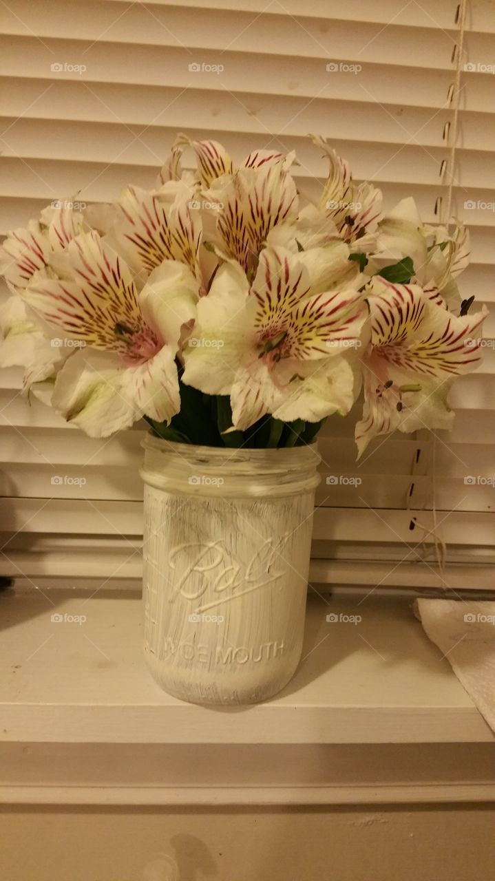 mason jar full of pretty flowers