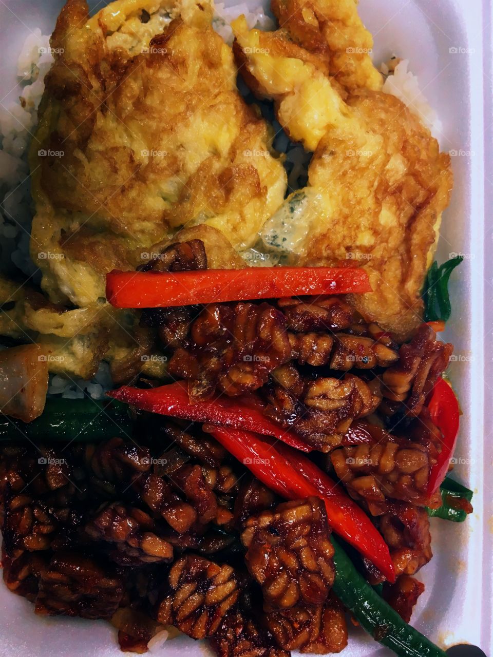 Fried rice with fried eggs and soya beans curds