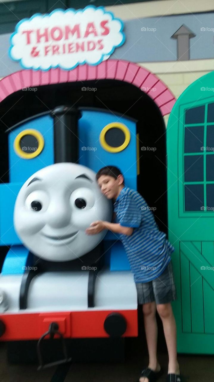 Happy Kid with favorite Train