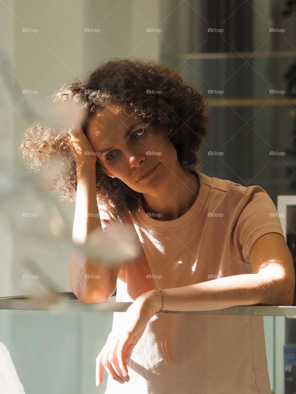 Portrait of young beautiful curly woman