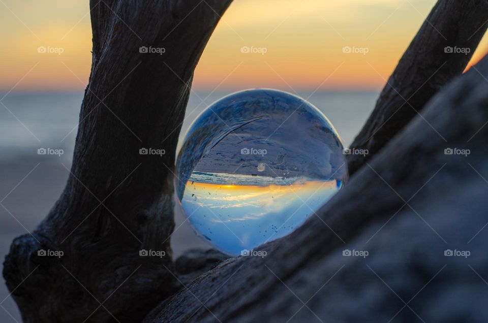 Beautiful and georges Baltic sea sunset through the lensball