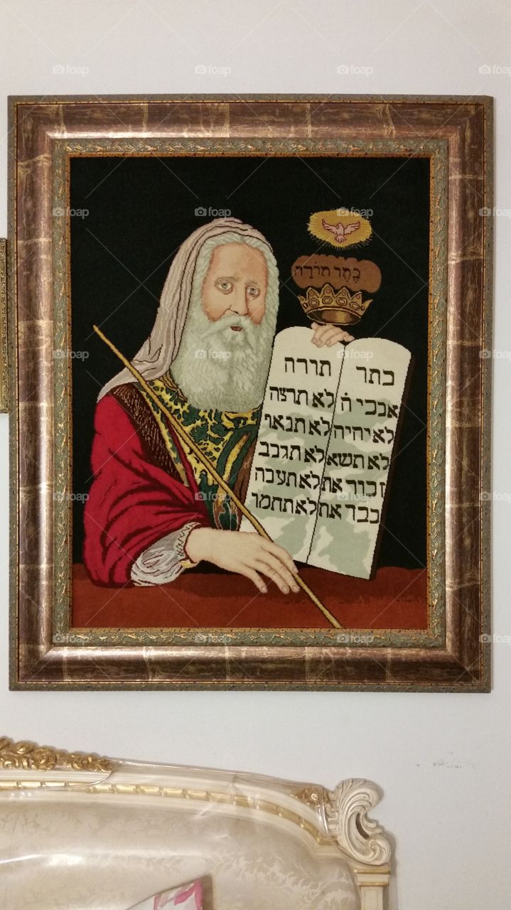 Moshe holding the Torah
Fine persian art on rug