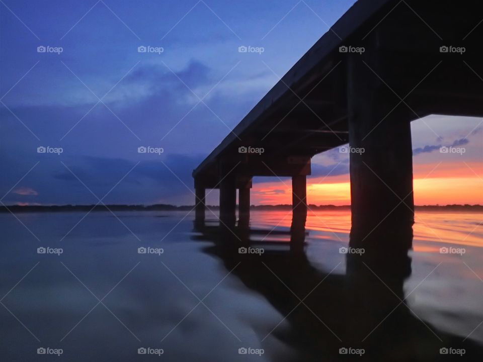 dock at sunset. dock at sunset at hampton lake