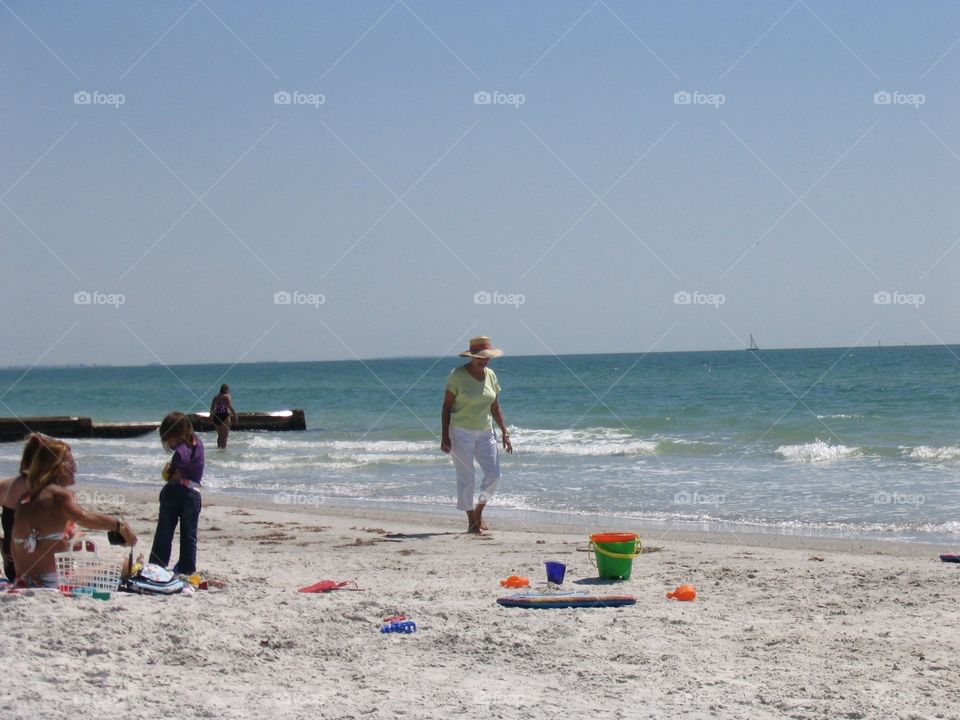 Senior Woman strolling Florida beach, active life. Senior Woman strolling Florida beach, active life