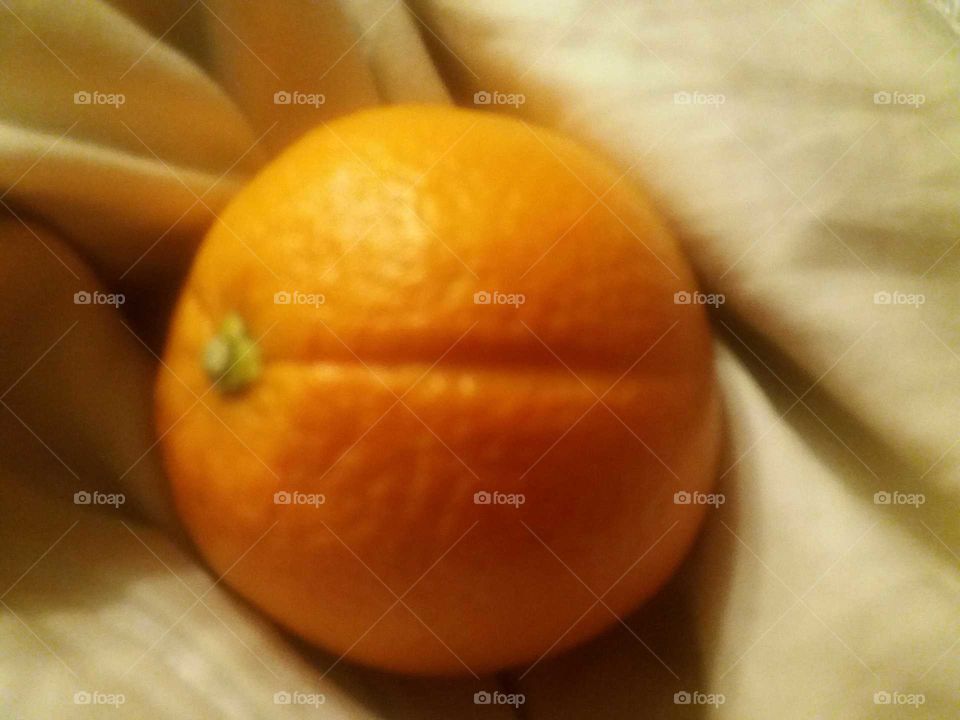 creased orange on creased sheet