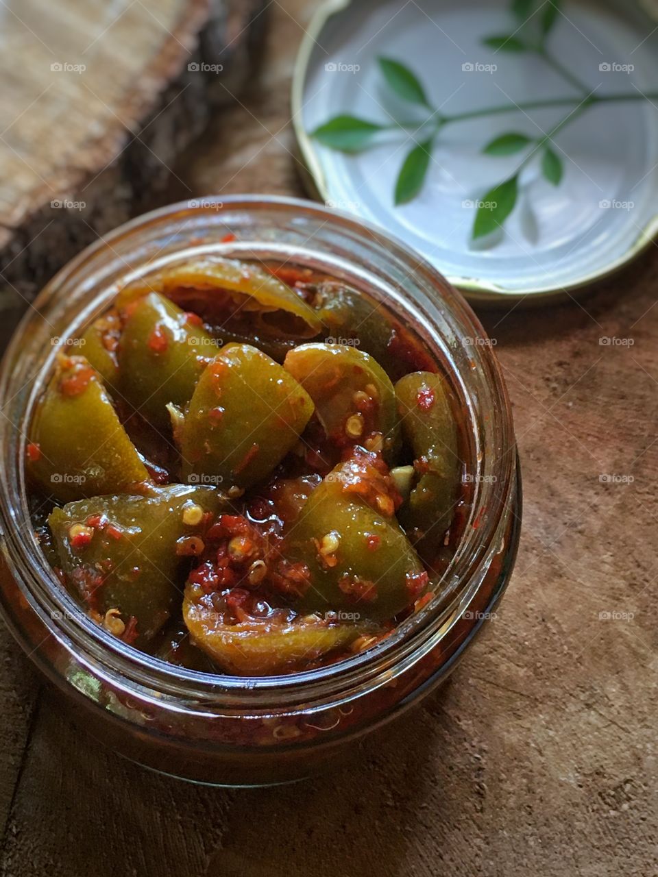 Homemade sweet and spicy lime pickle .