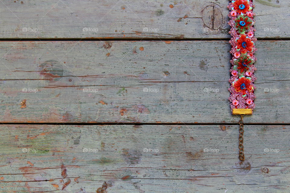 Bracelet on wooden table