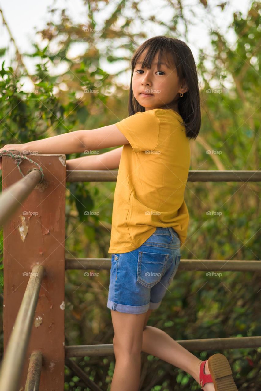 A young little girl flaunting her spring casual clothing