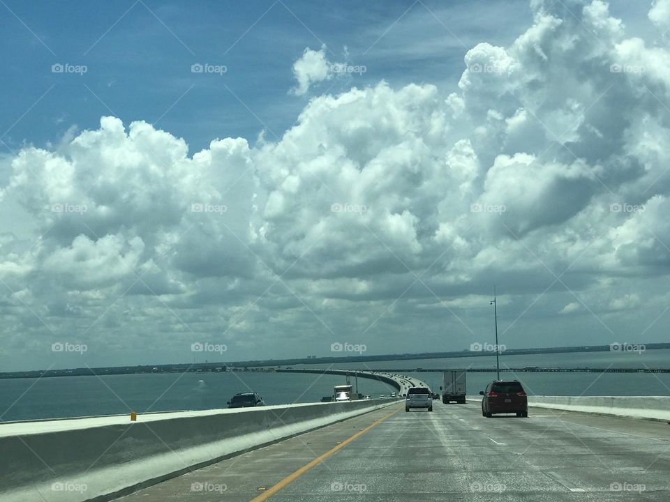 Commuting over a long bridge. 