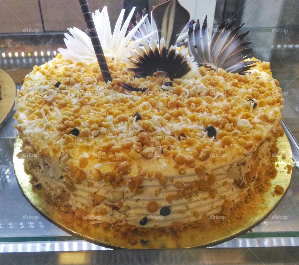 dry nuts filled white forest cake