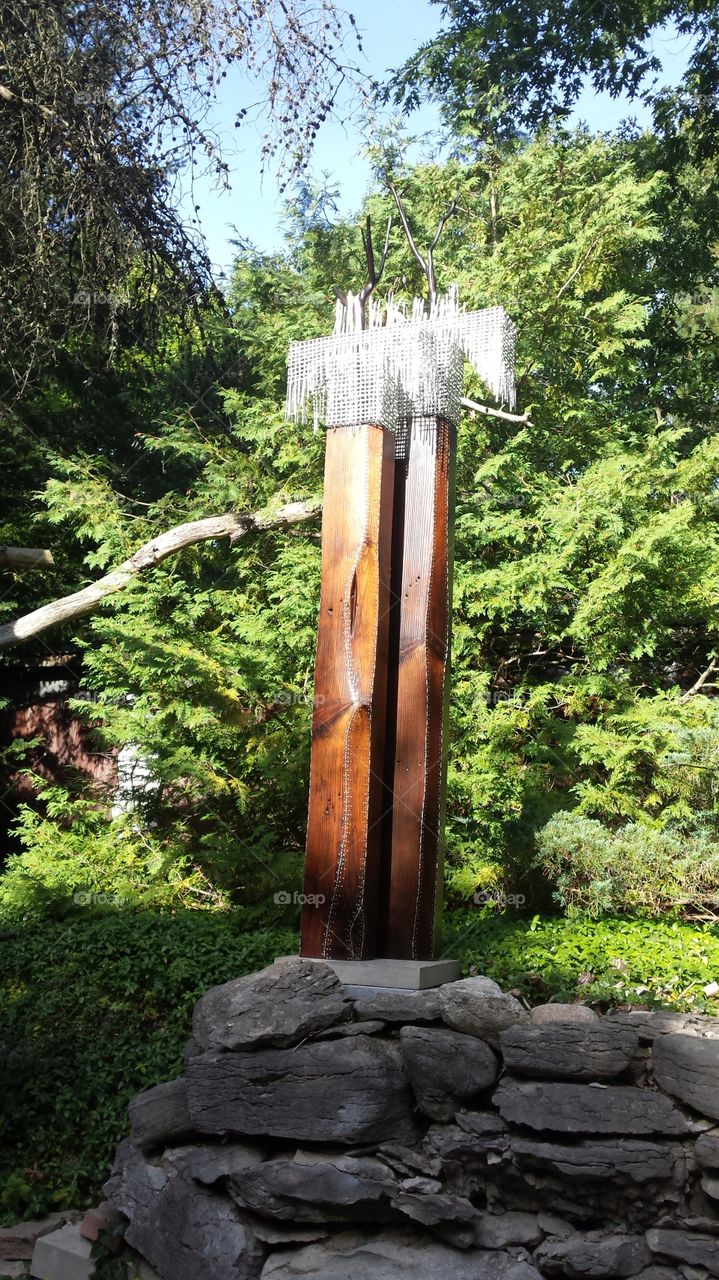 Metal on Wood Garden Sculpture