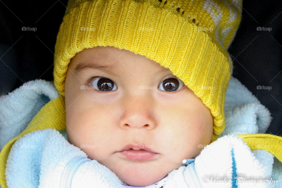 Cute toddler with big dark eyes