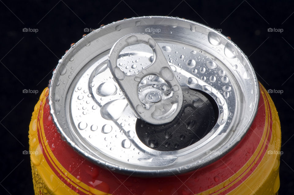 can of soda With water drops