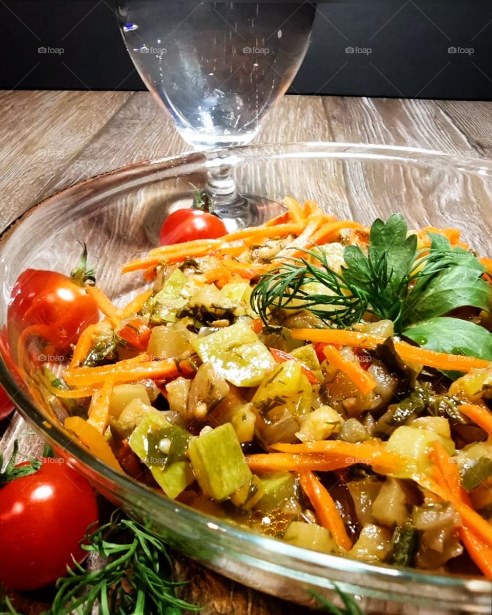 Spring vegetable salad and glass of water