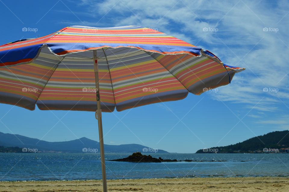 Colourful umbrella on beach