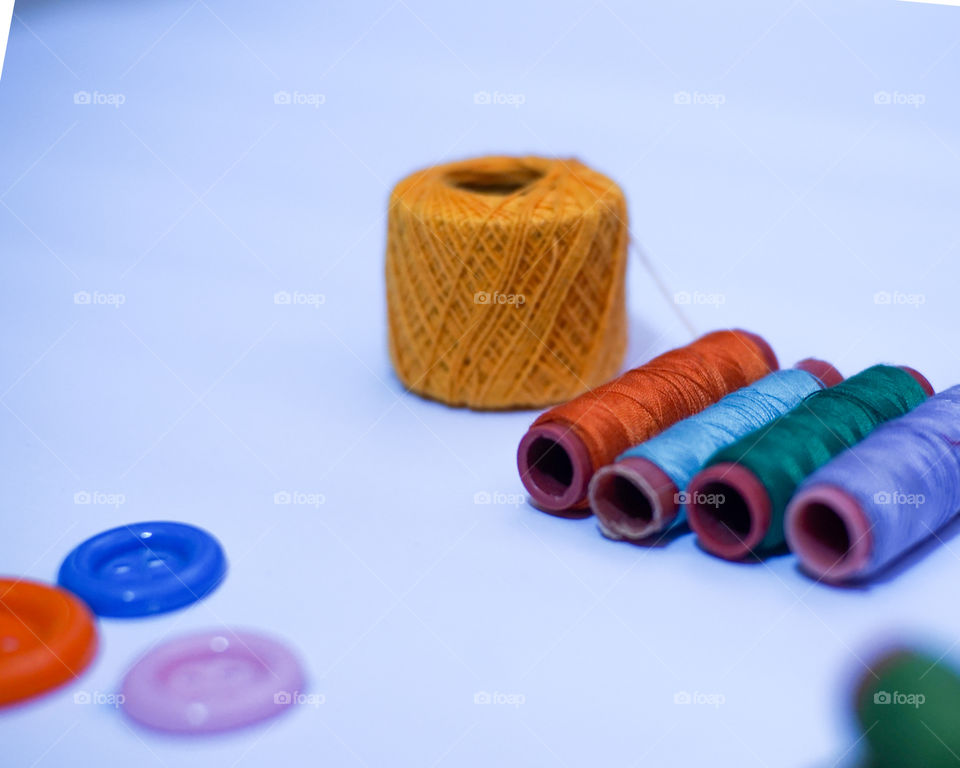 a set of colorful sewing tools.