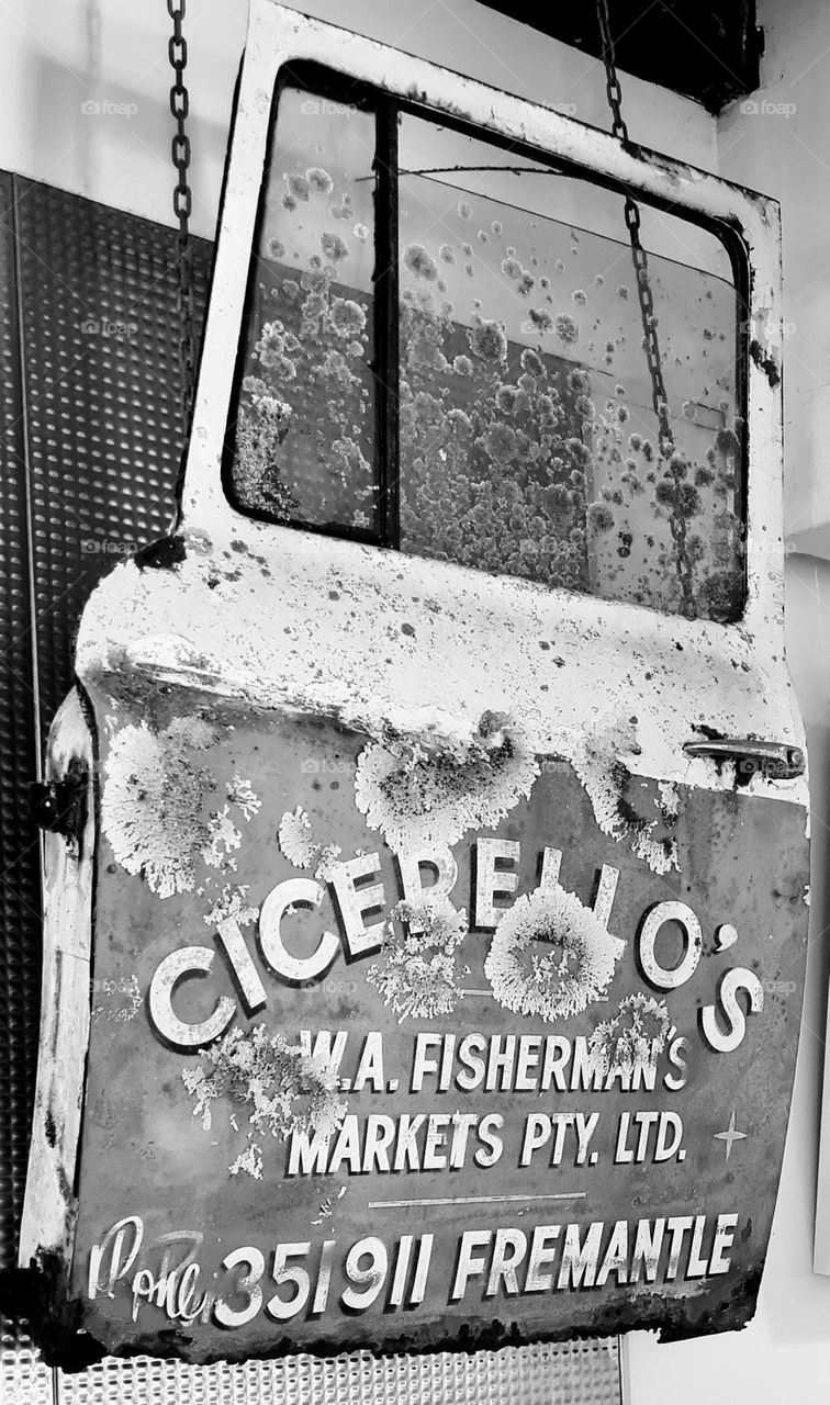 Weathered truck door covered in lichen!