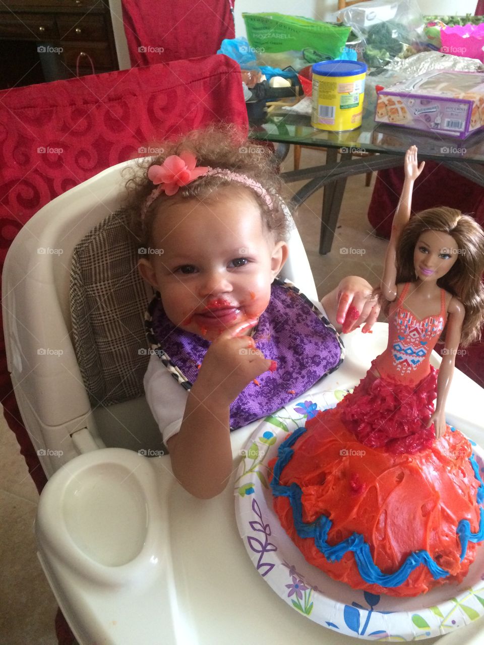 Baby enjoying birthday cake 