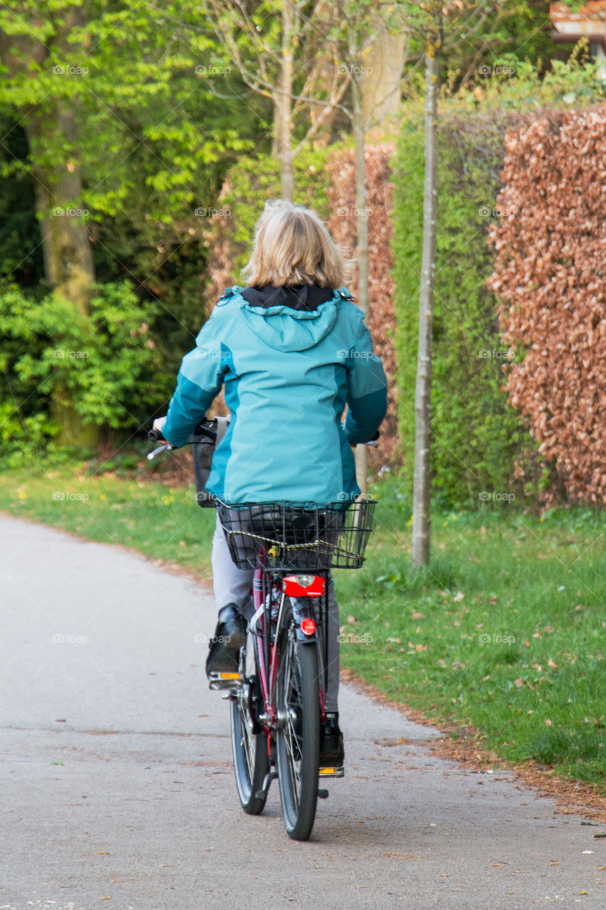 Woman riding her bike