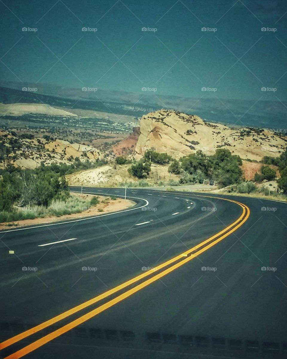 Road curve through high desert. Beautiful scenery.