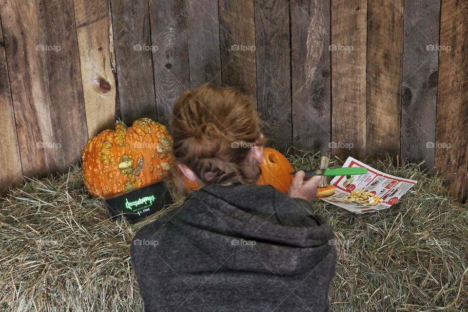 Watching Halloween shows and carving pumpkins.