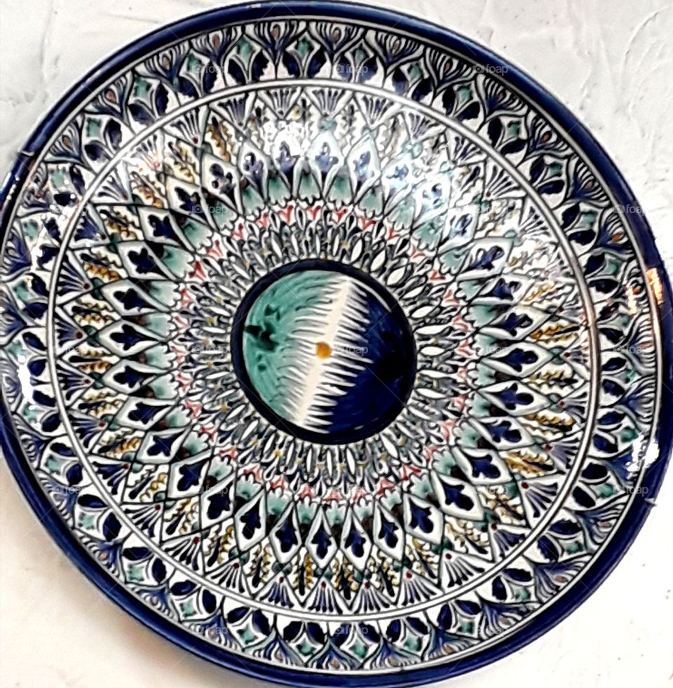 Russian traditionalplate on the white wall