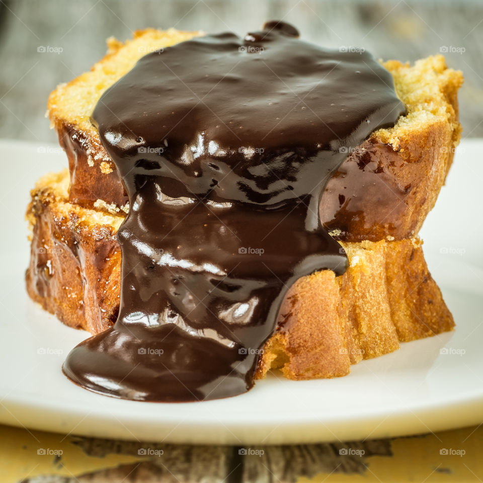 Hot chocolate on slice of cake