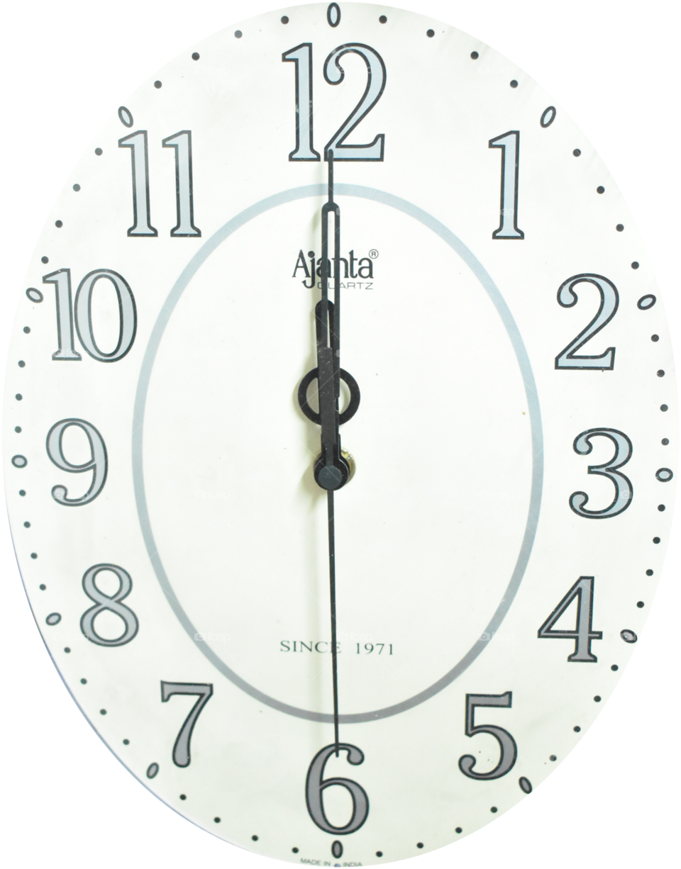 wall clock ,white color at 12:00 pm/am,watch