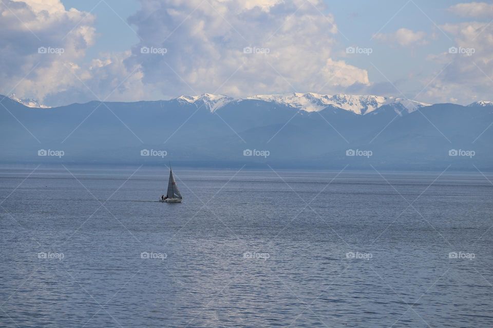 Boat sailing in calm ocean 