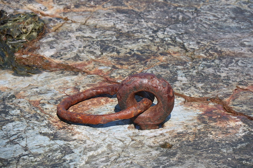 Chained rock