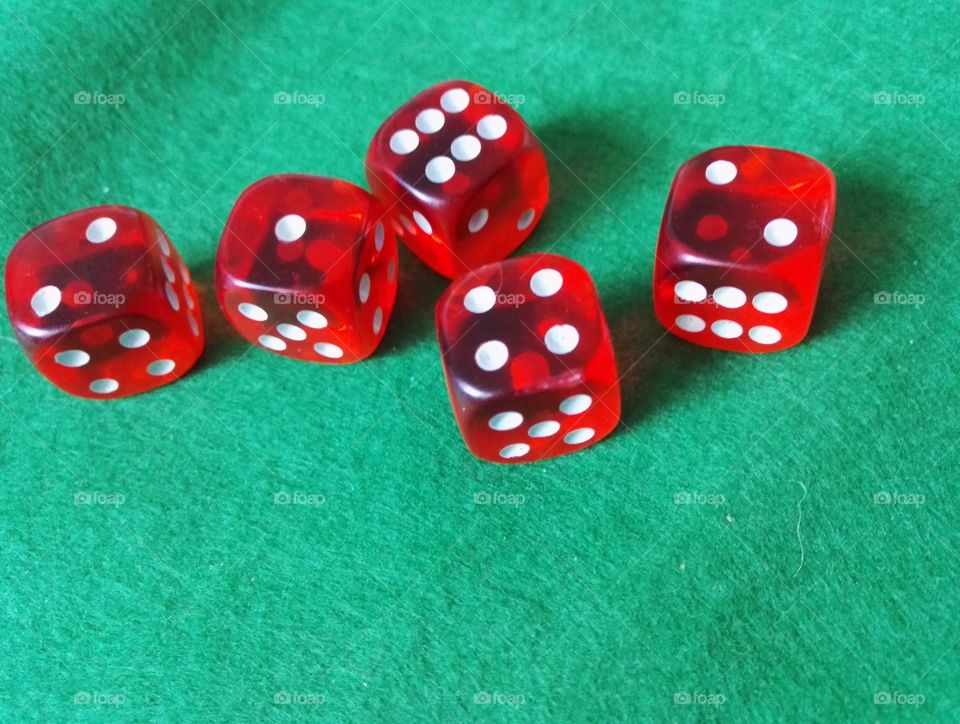 Red Dices on Green Table