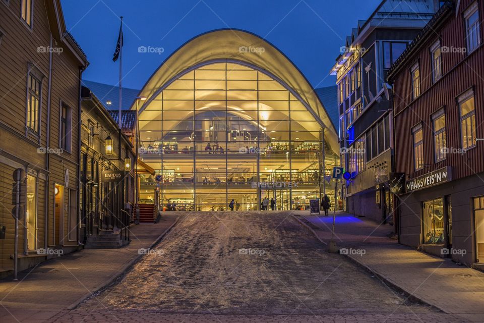 City library . A library looks like a warm place in a cold winter evening. Photo taken in Tromsø, Norway 