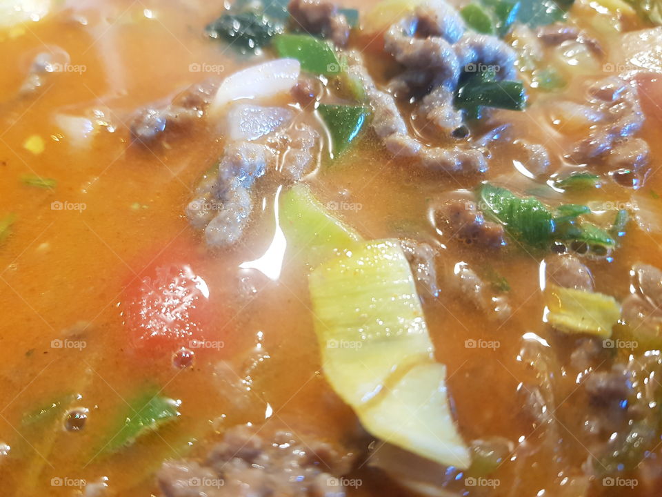 Sauce for a macaroni dish. With minced beef and an Italian vegetable package. Quick, easy evening meal.