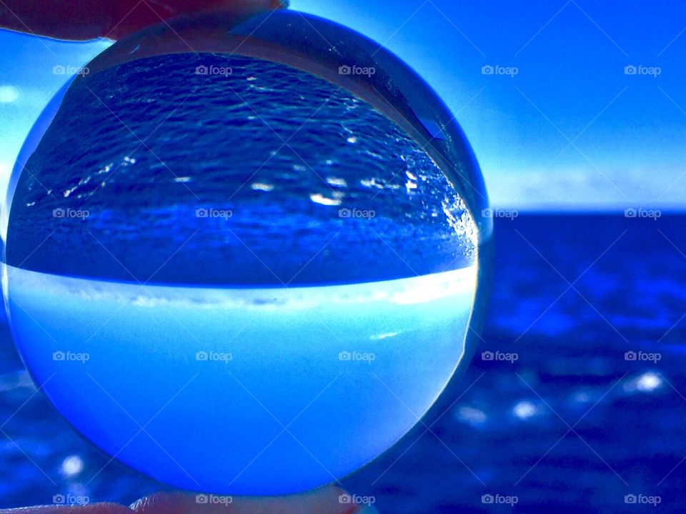 Crystal Blue. The azure water of the Caribbean Sea taken through my lens ball.  Beautiful. 