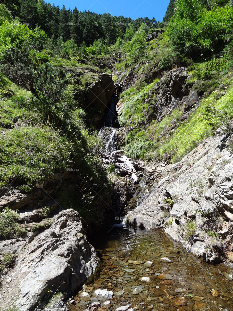 Rocky waterfall and river