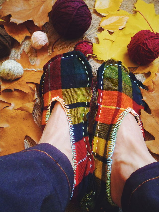stitched warm slippers and autumn leaves