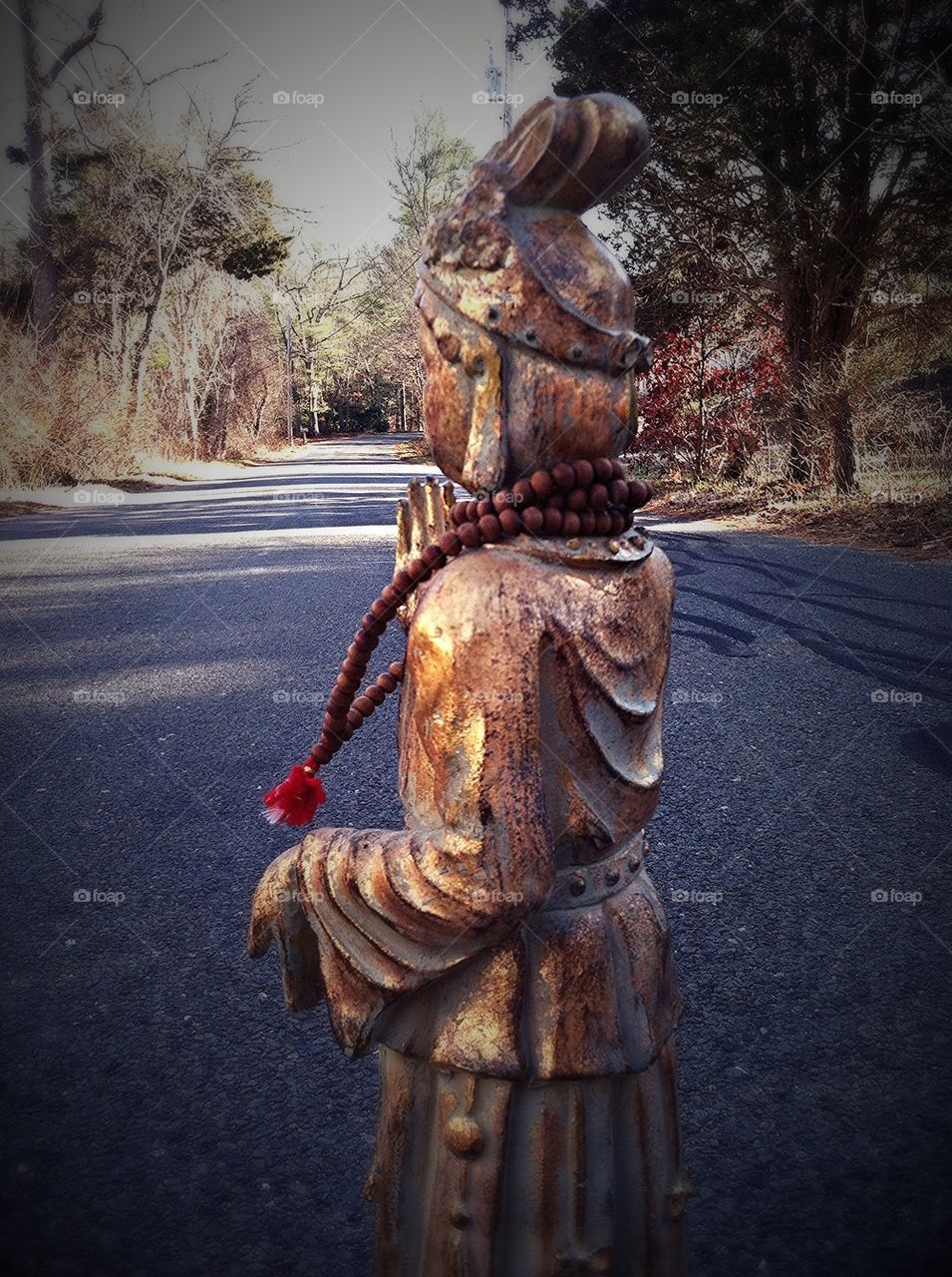 Buddha in the road