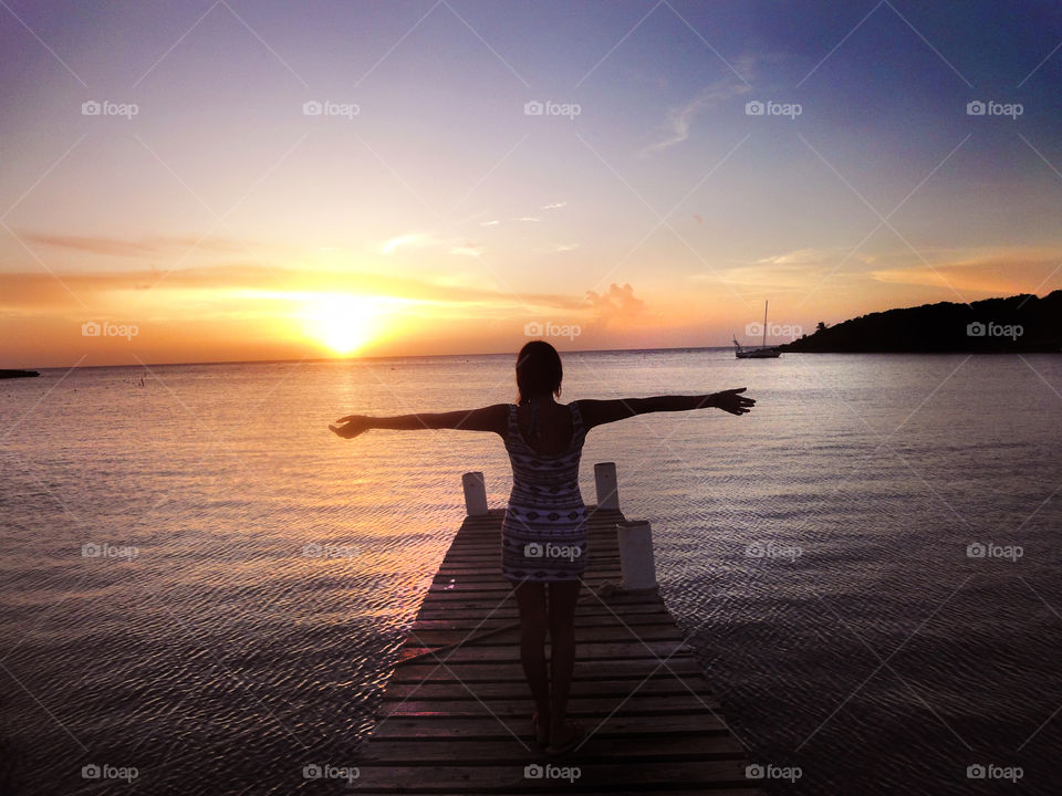 sunset on the beach woman