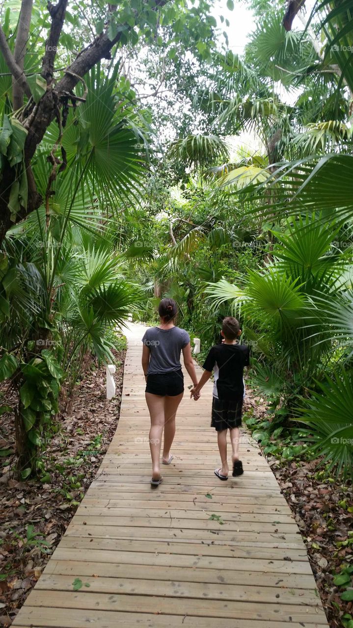 vacation bonding siblings palm trees