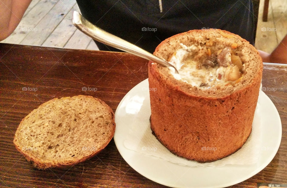 hot soup in a loaf of bread