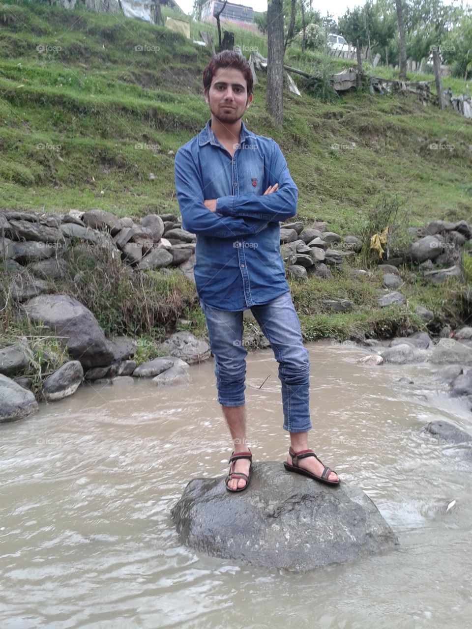 Kashmiri Man In Stream