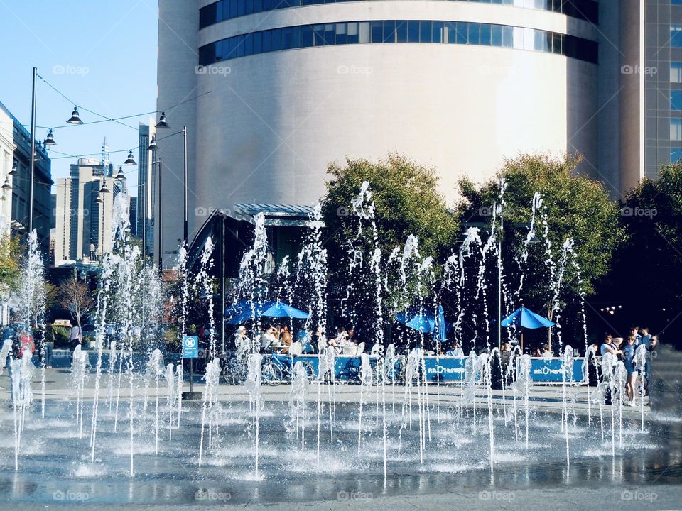 A splash pad. A welcoming site on a hot sultry summer day in the city. 