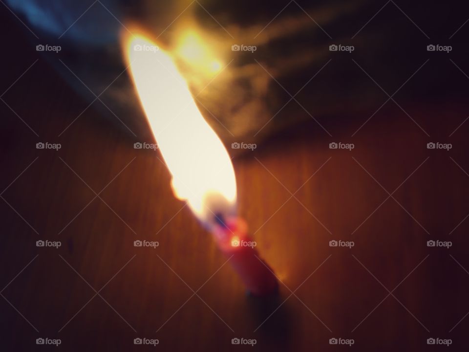 red candle burn in night